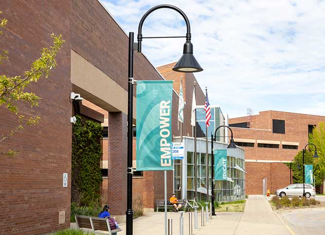 A banner at Oakton College's Des Plaines campus entrance.