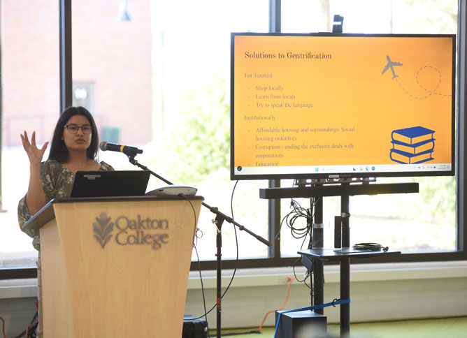 Oakton Rice student presenting at opening.